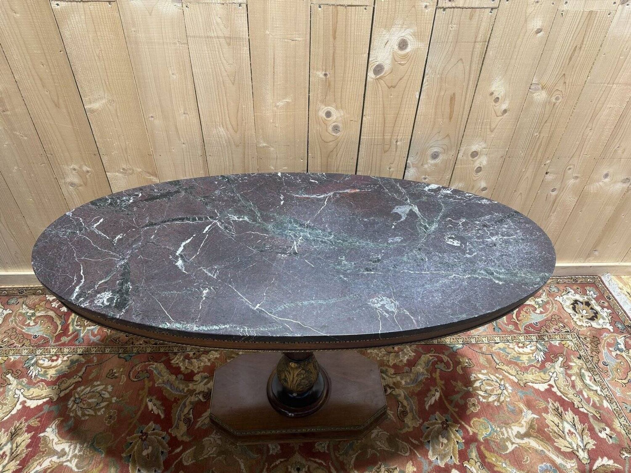 Oval Empire-style gueridon in walnut and marble.