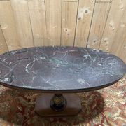 Oval Empire-style gueridon in walnut and marble.