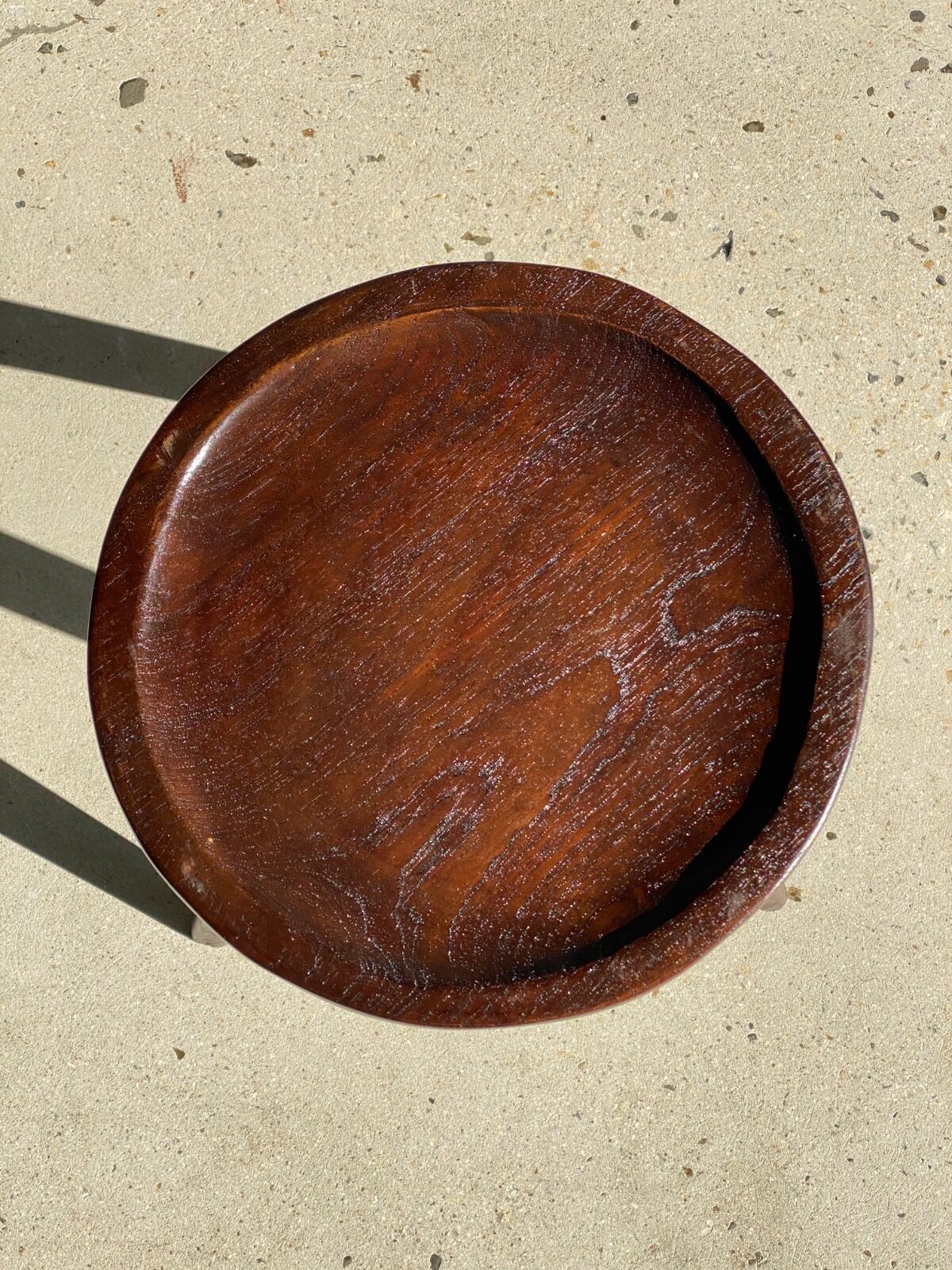 Brown solid wood stool seated circular dug