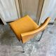 Chair in chromed metal and ochre skaï 1970s