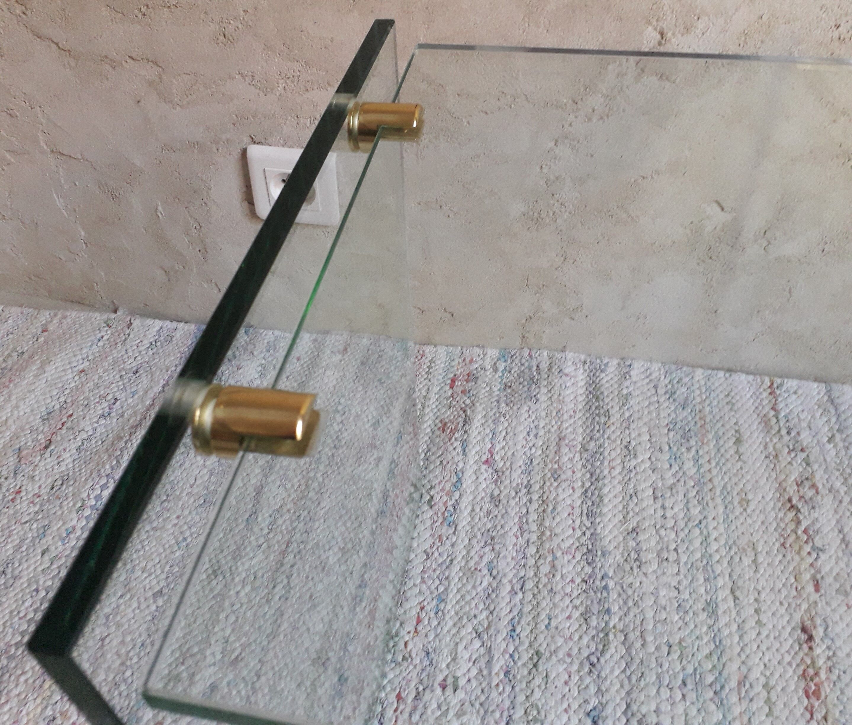 Glass and brass coffee table