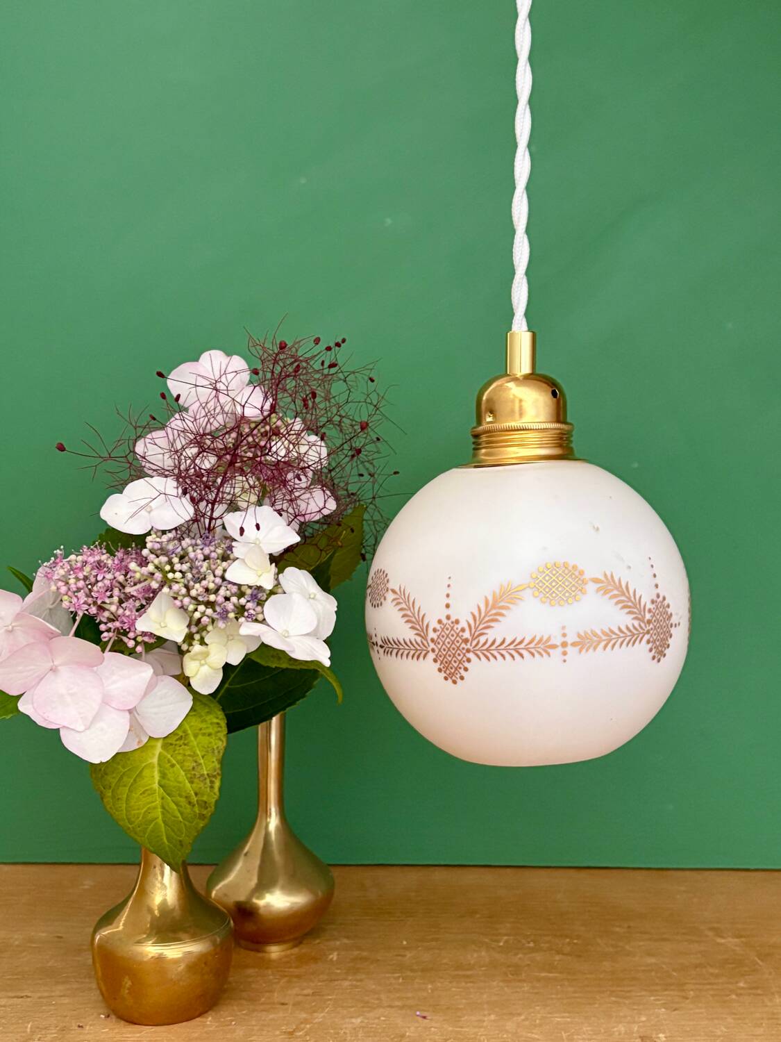 Vintage globe pendant light in white opaline with gold designs