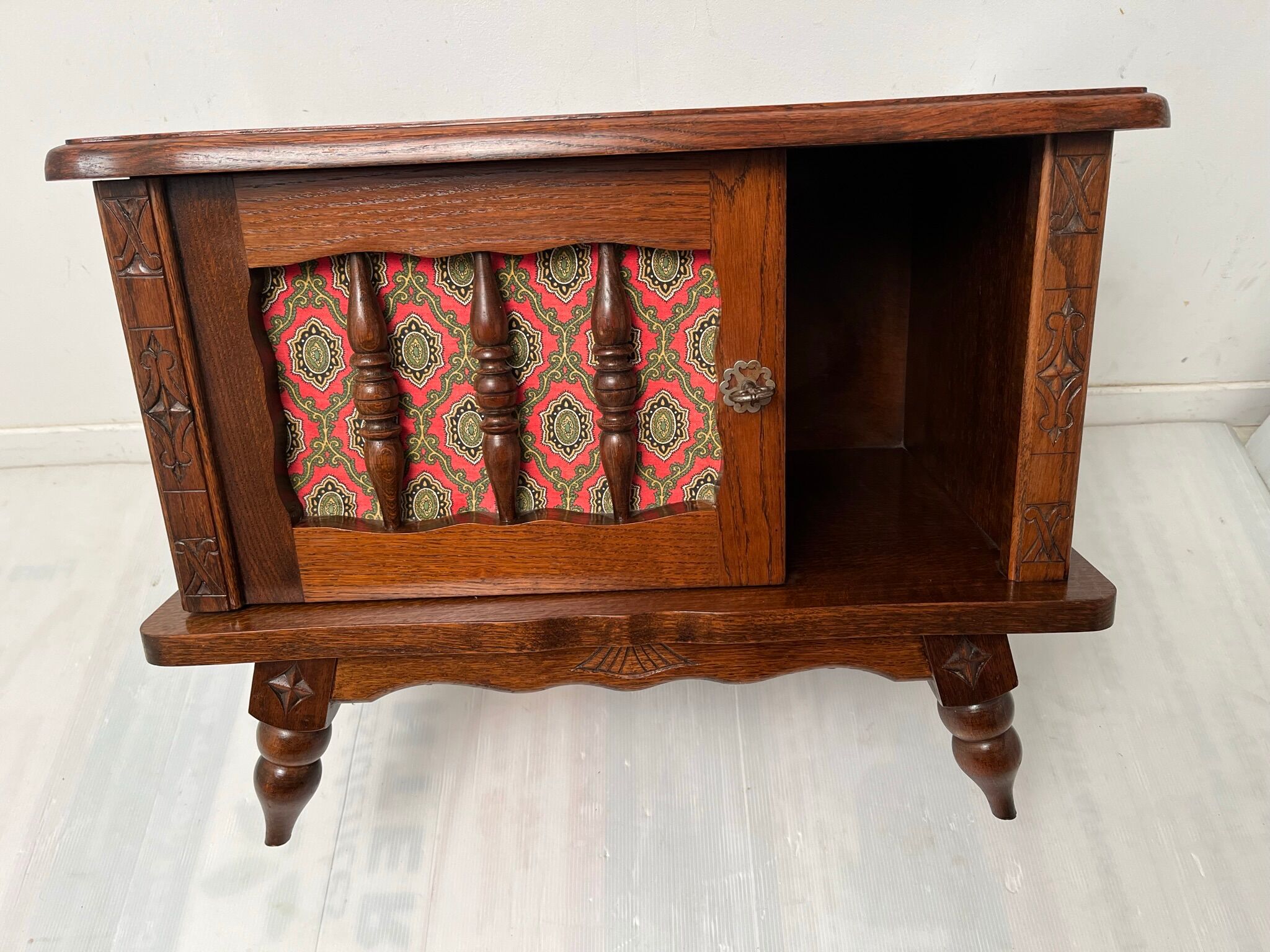 Vintage carved wooden bedside table