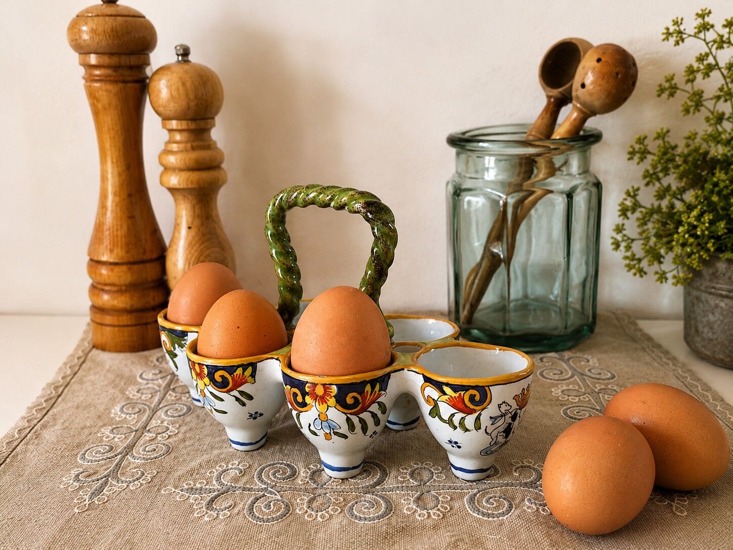 Antique egg holder by Jules Verlingue with polychrome floral decoration.