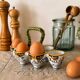 Antique egg holder by Jules Verlingue with polychrome floral decoration.