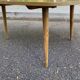 Scandinavian coffee table in the shape of a pebble/bean made of light solid wood from the years.
