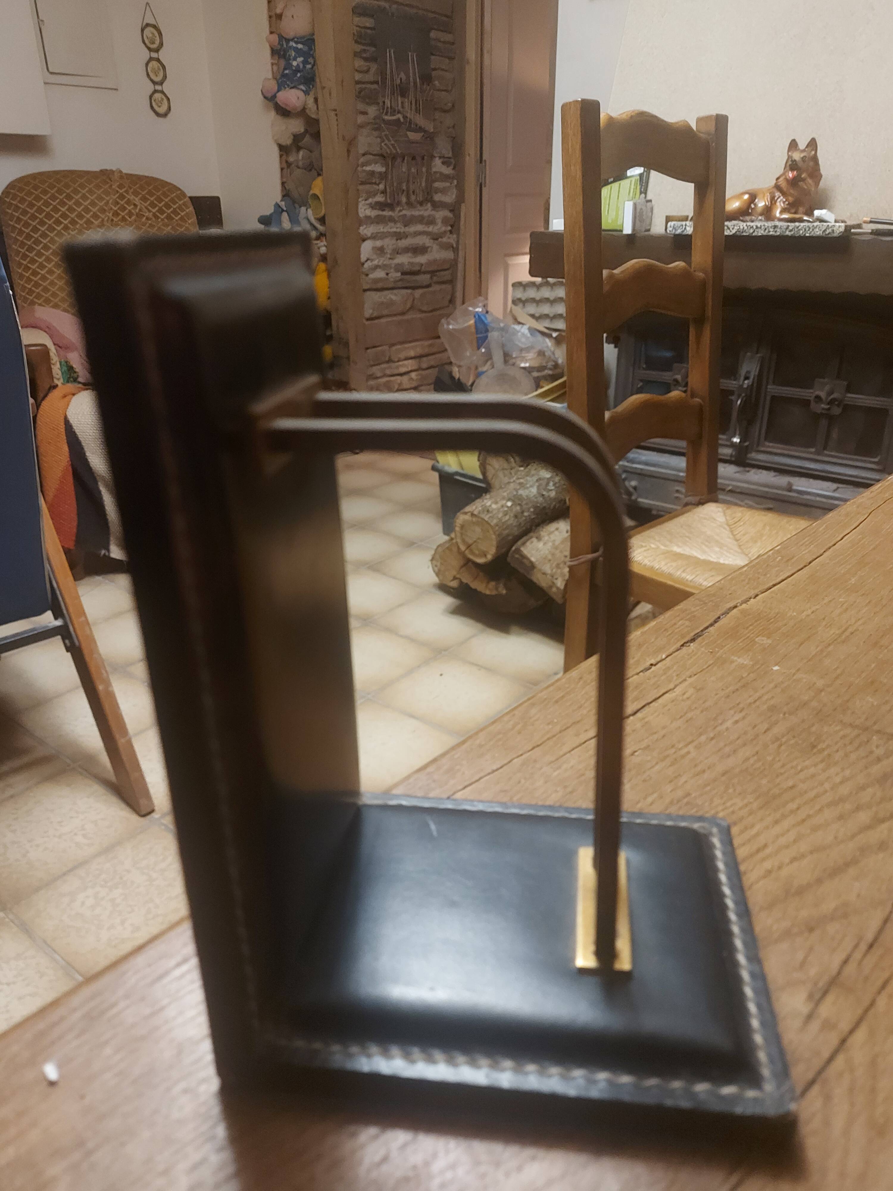 2 modernist leather bookends attributed to Jacques Adnet