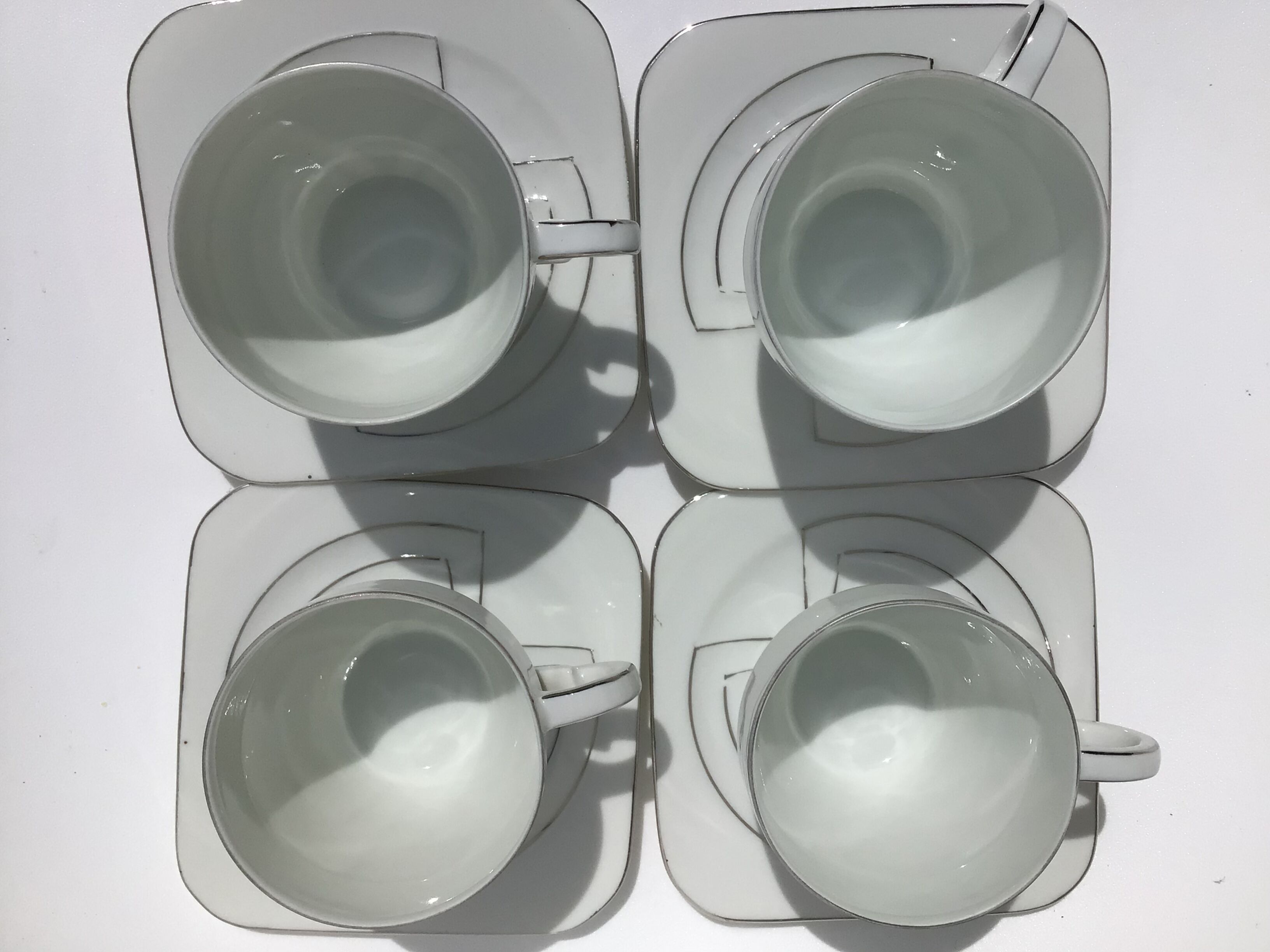 4 fine porcelain cups art deco silver thread