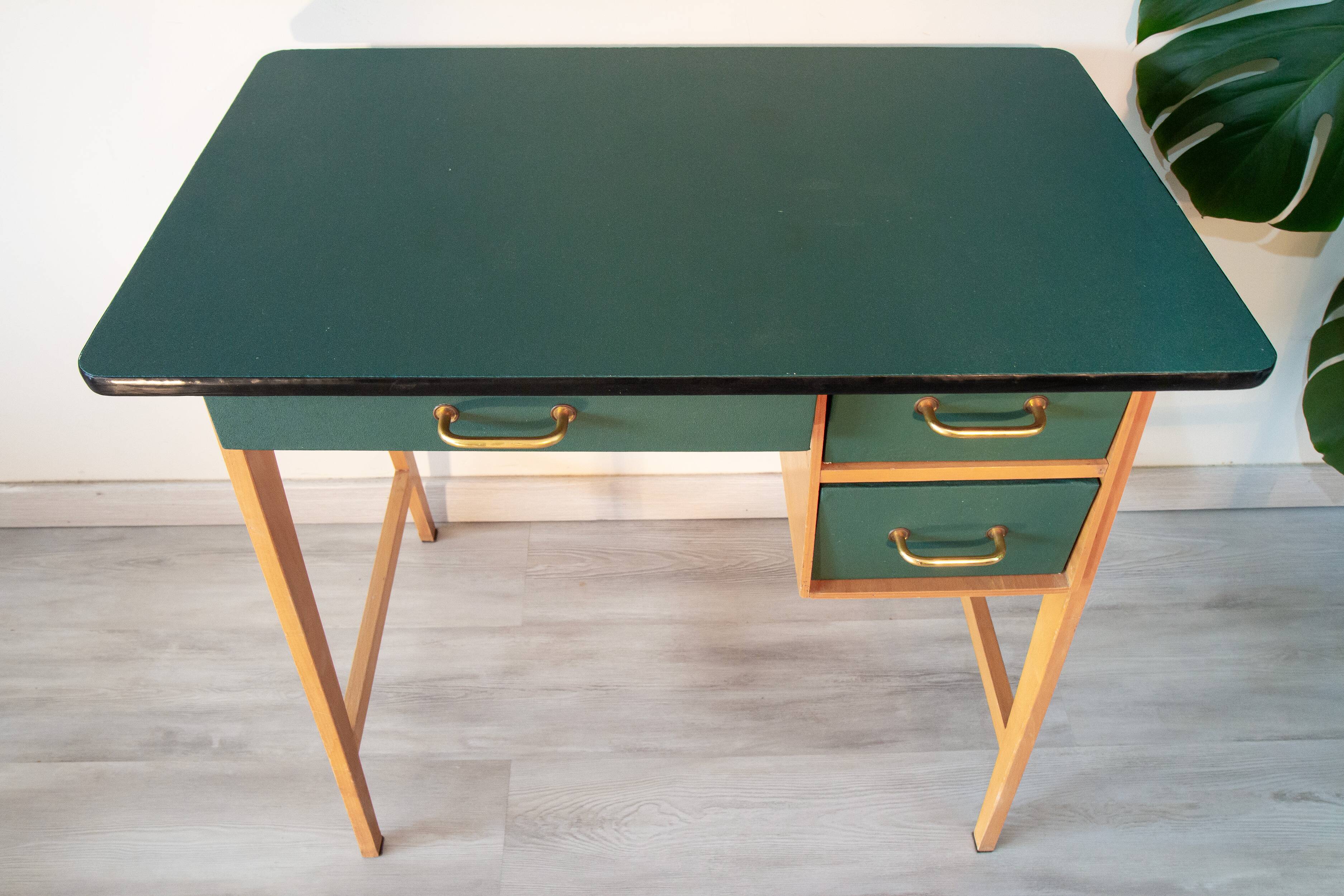 Desk and its green and wood chair, 1950s