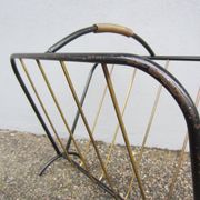 Porte revue en acier et laiton