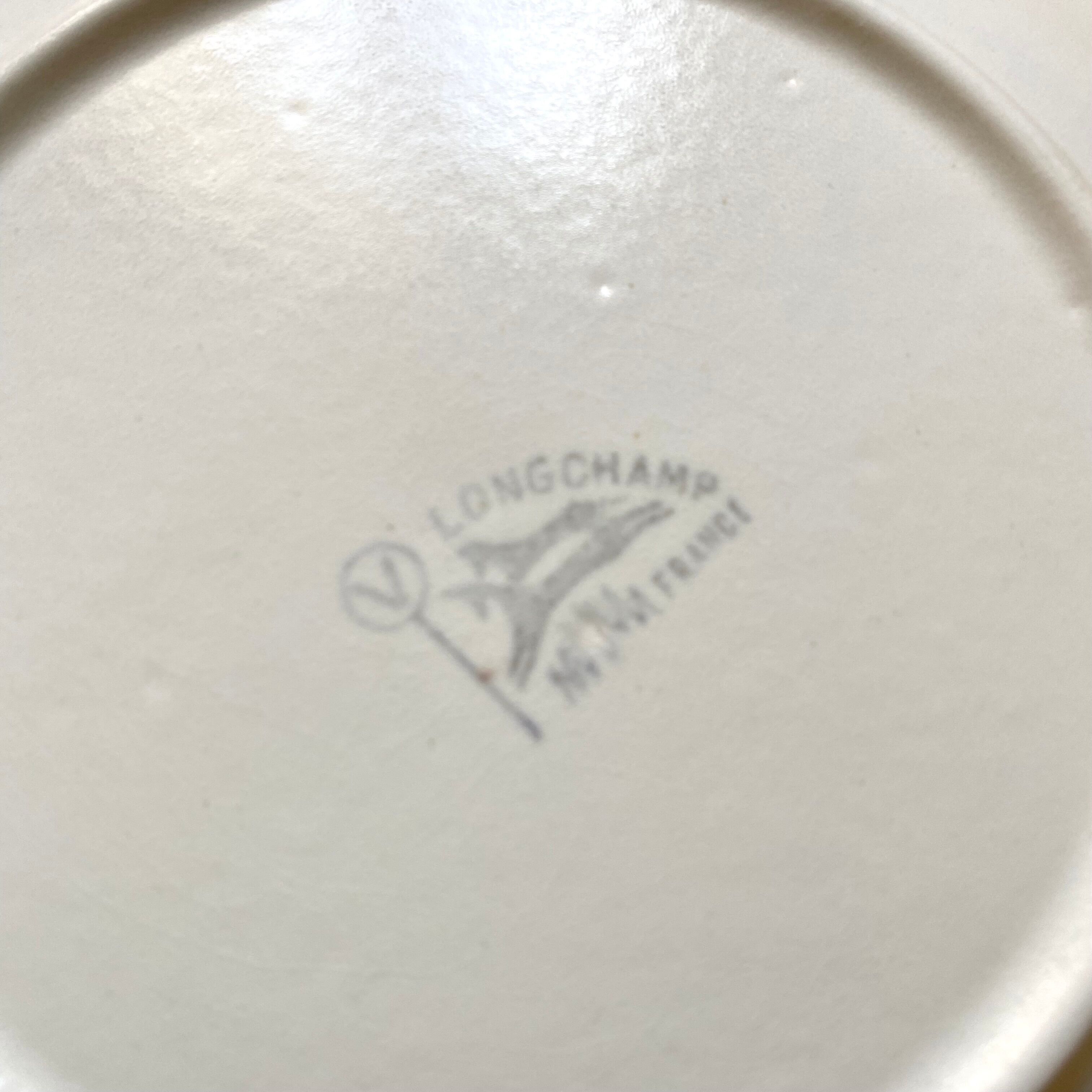 Longchamp dinner plates with fish decor