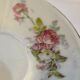Tasse et sous tasse à décor floral et oiseau