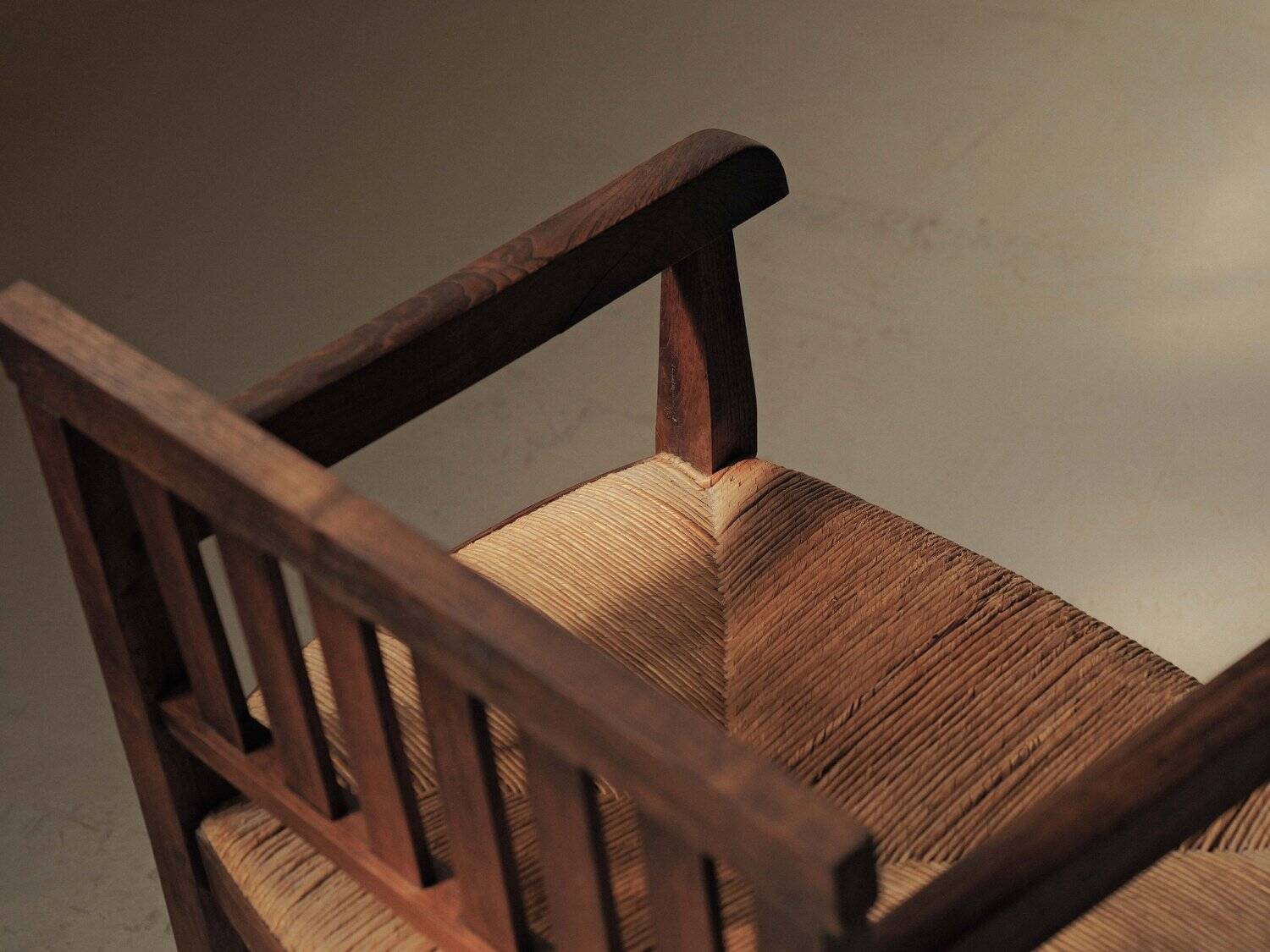 Handcrafted oak and straw armchair, France, circa 1950.
