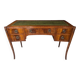 Art Deco desk in curved mahogany veneer.
