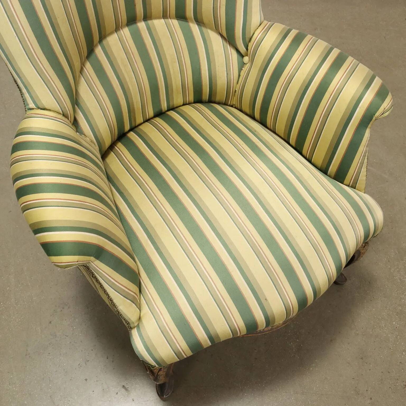 Antique upholstered and lacquered wooden armchair, Italy, late 19th century.