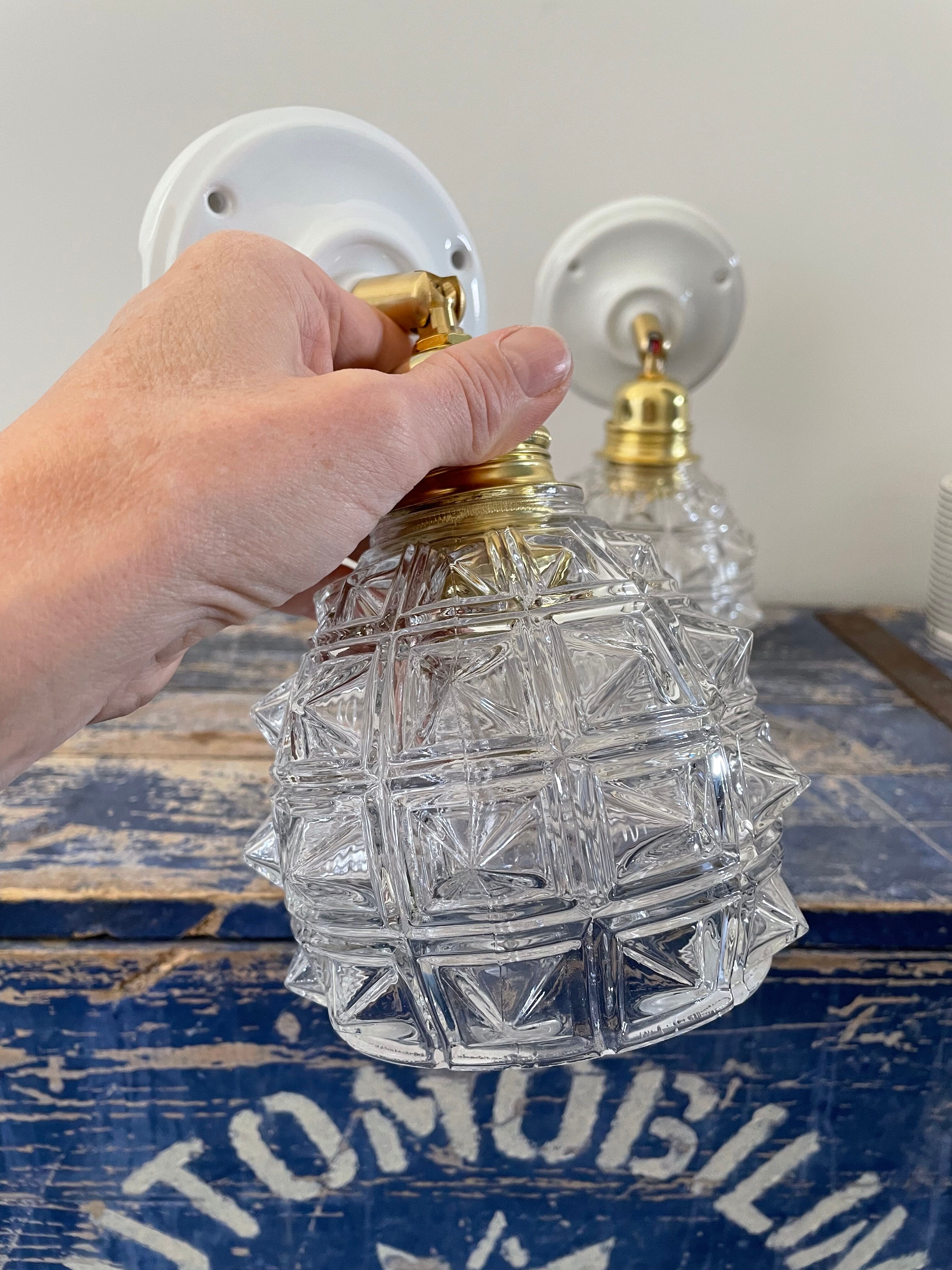 Pair of new electrified chiseled glass sconces