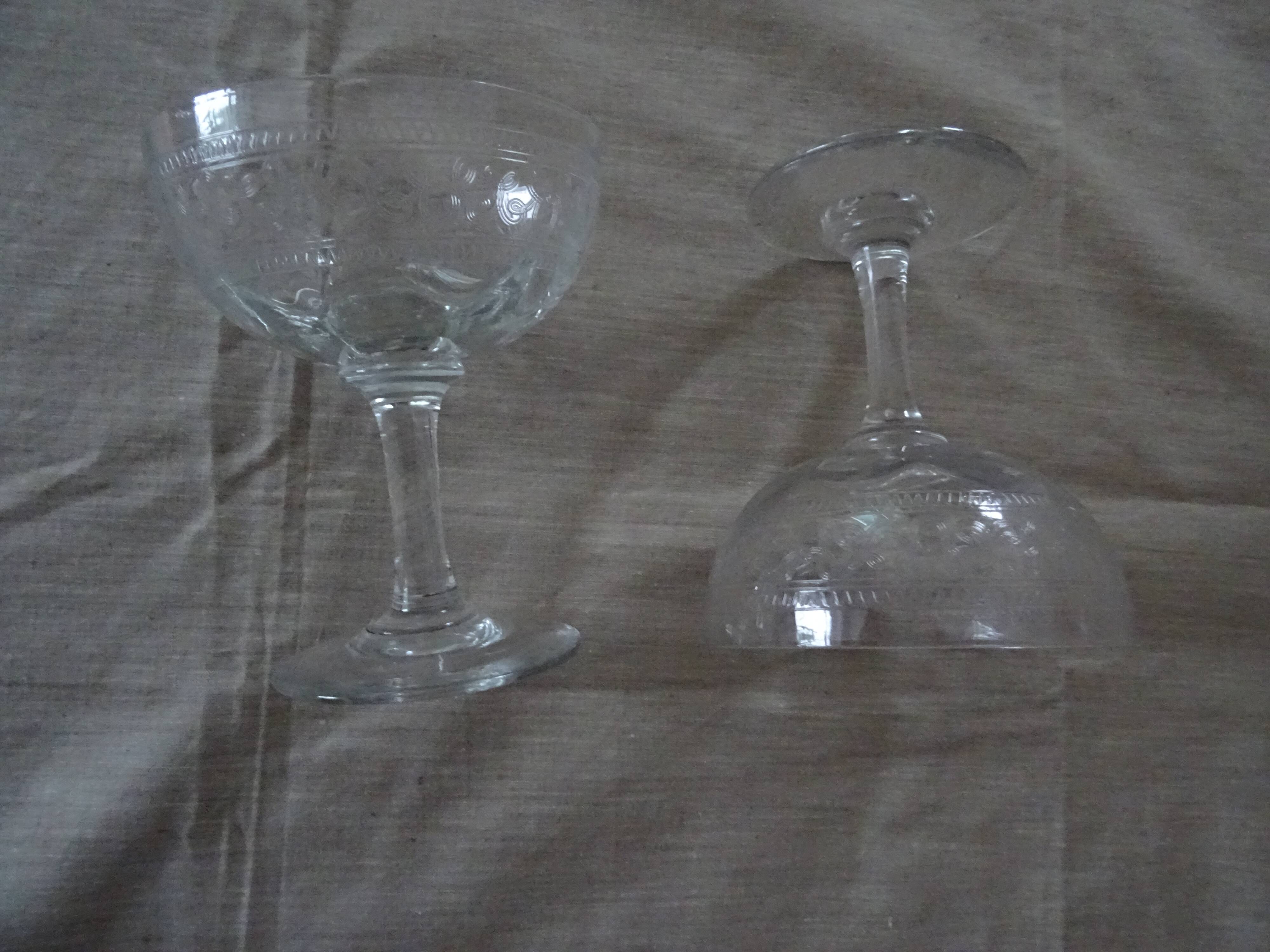 Pair of old crystal champagne glasses wide frieze right foot