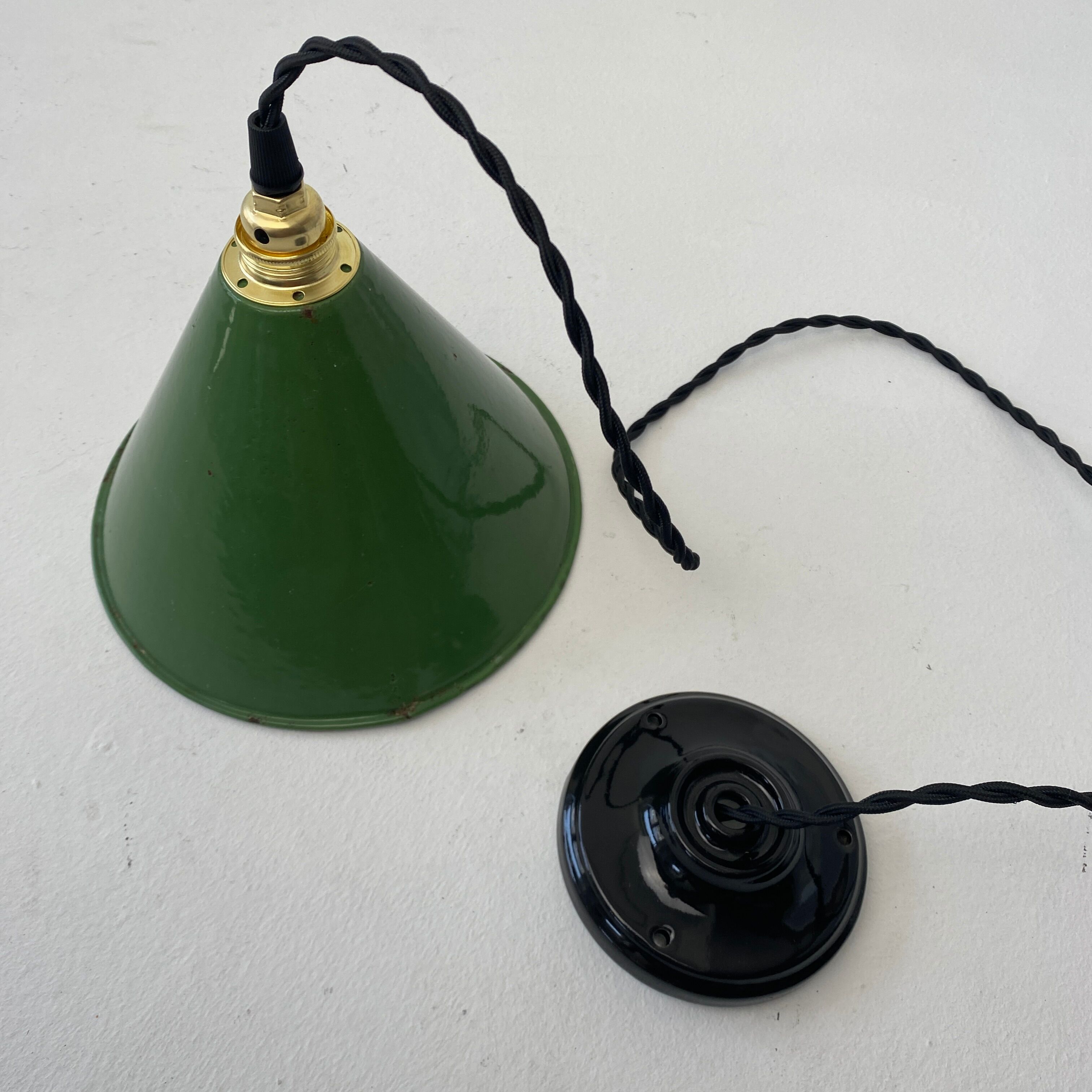 Old green enamelled conical industrial hanging lamp