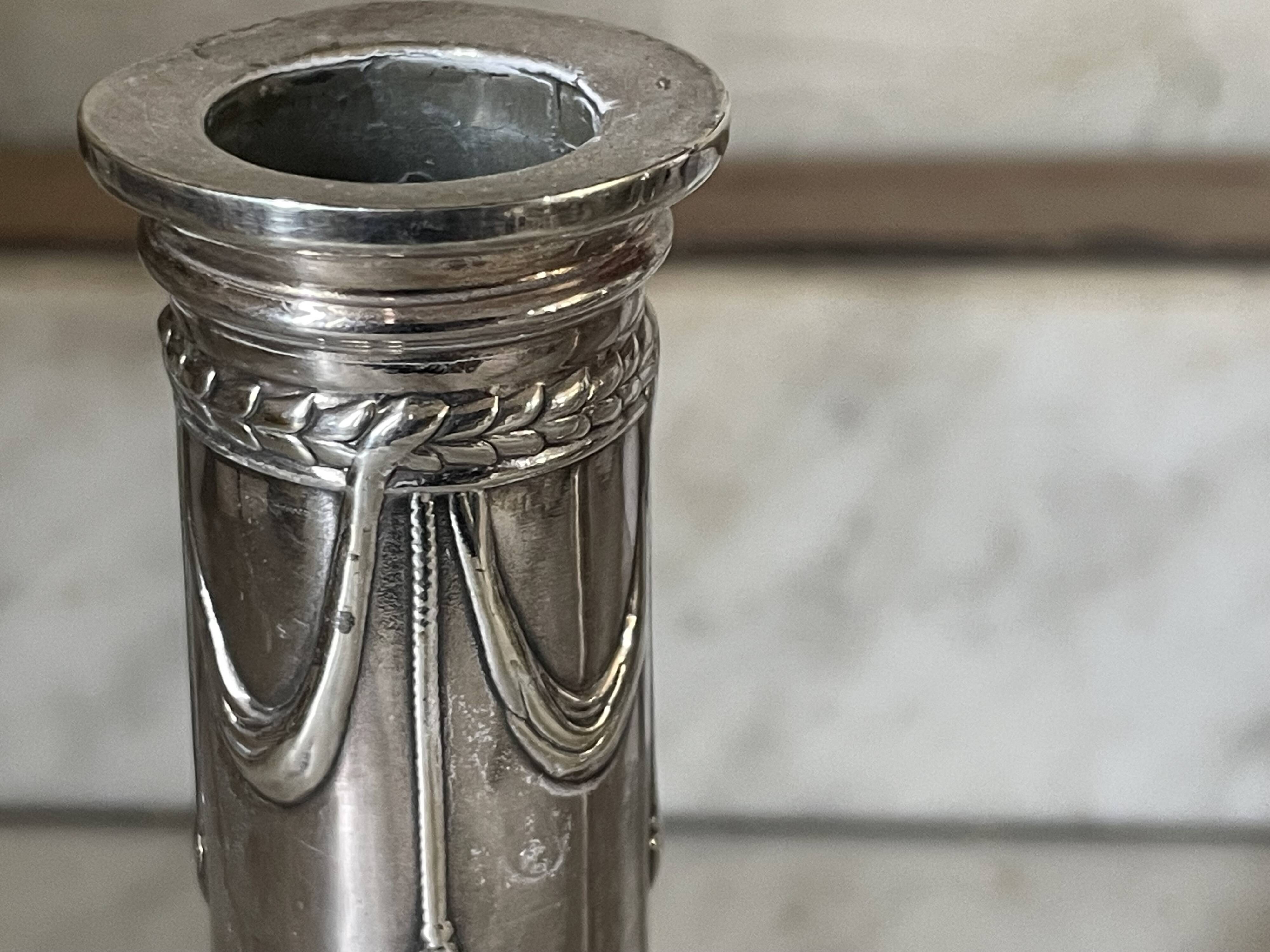 pair of Victorian style silver-plated candlesticks