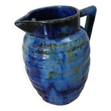 Antique pitcher in enamelled ceramic