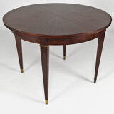 Art Deco mahogany round table by Jacques Adnet, circa 1940