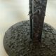 Pair of black metal candlesticks