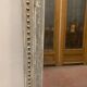 Louis XV style mirror in wood and patinated stucco 19th century