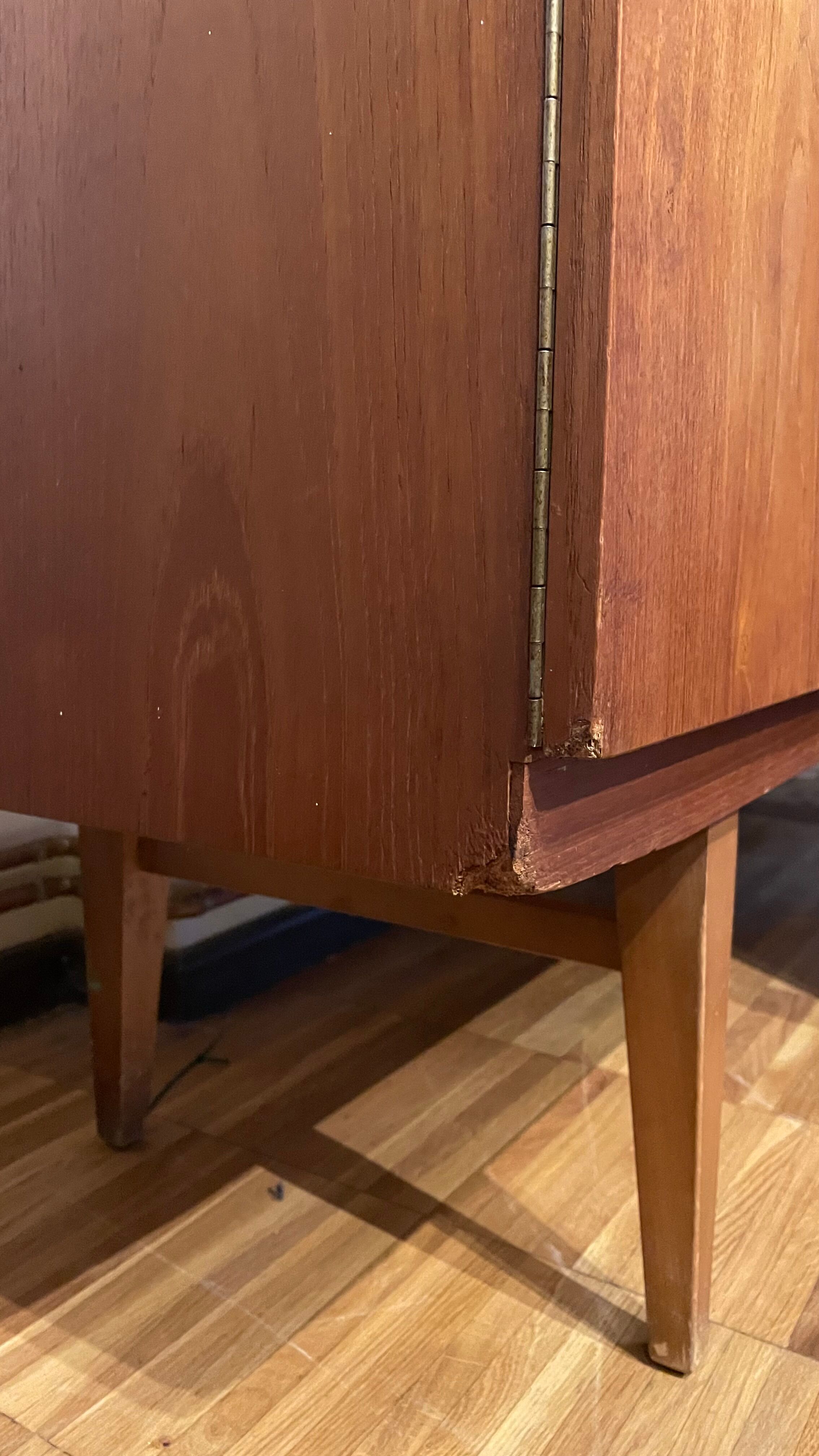 Atypical teak row from the 60s