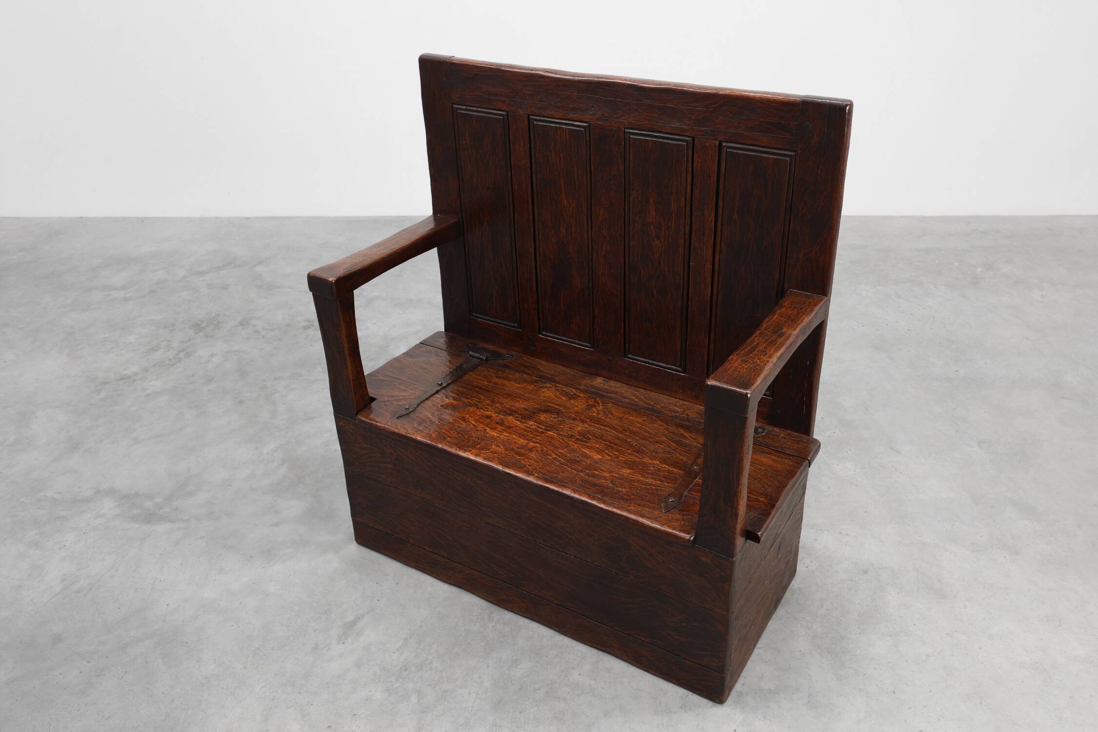 Rustic solid oak carved bench with storage compartment, France 19th century