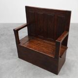 Rustic solid oak carved bench with storage compartment, France 19th century