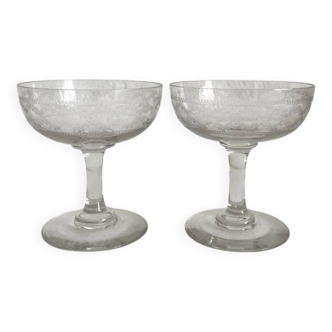 2 antique champagne glasses in engraved glass