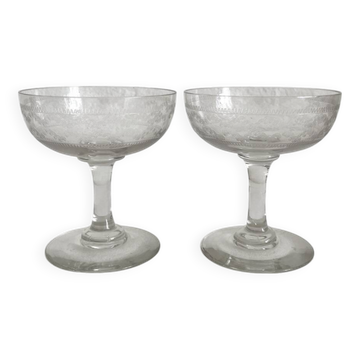 2 antique champagne glasses in engraved glass