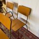 Set of 2 vintage school chairs and 2 armchairs.