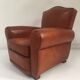 Large club chair in cognac leather