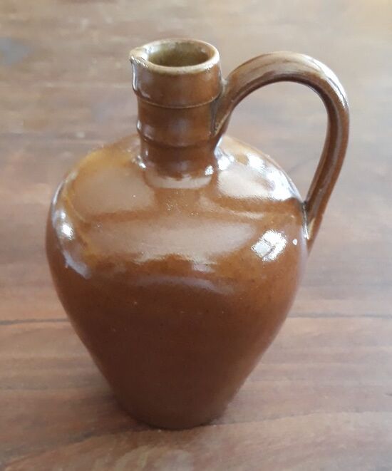 Small pitcher sandstone - 60s/70s - " Federal law forbids dirty. Or reuse of this bottles "