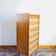 Commode semainier vintage bois et osier pieds compas