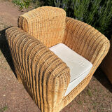 Large rattan armchairs