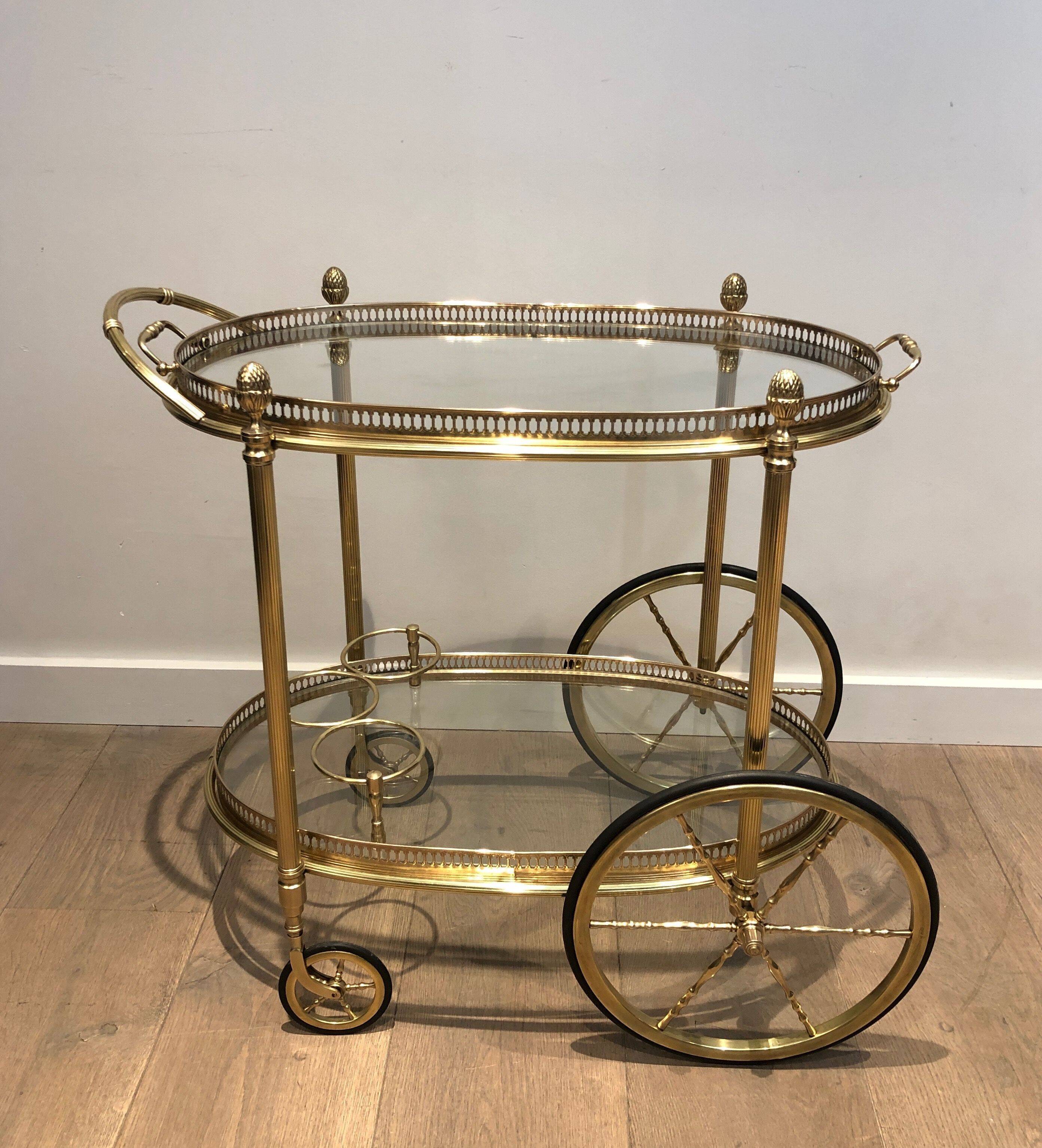 Oval brass trolley from Maison Baguès.