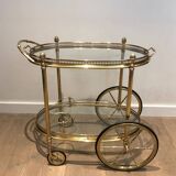 Oval brass trolley from Maison Baguès.