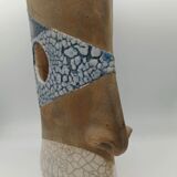 Pair of ceramic face vases