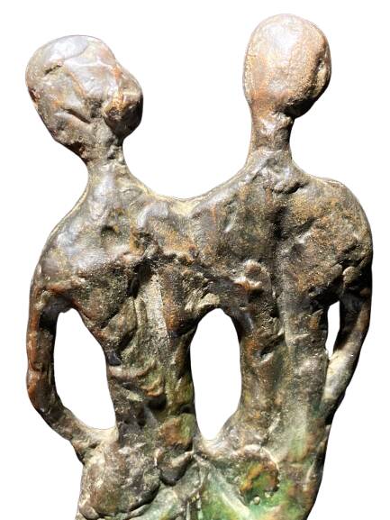 Sculpture of a man and a woman in spelter, signed Patsoglou