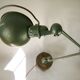 Jielde table lamp with 2 arms on a wooden base.