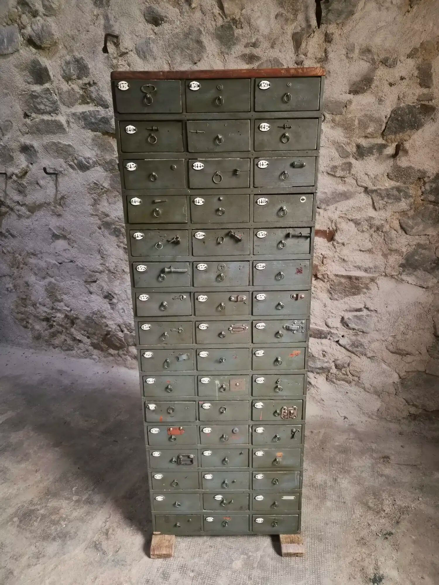 Antique hardware cabinet with 48 drawers, circa 1900.