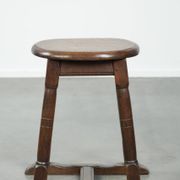 Antique Dutch oak stool from the early 19th century with a nice design