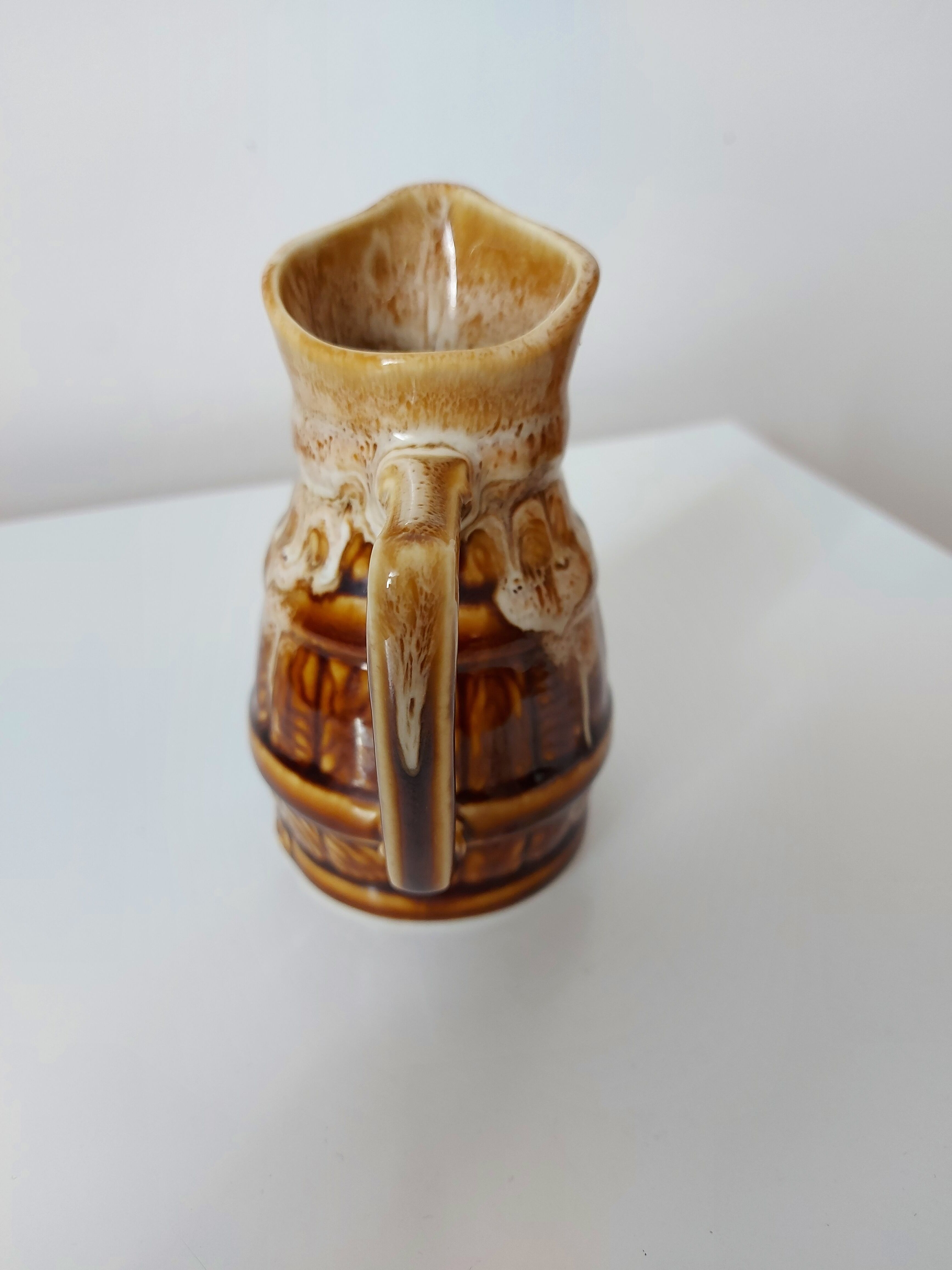 Vintage pitcher revol