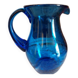 Blue carafe in bubbled blown glass similar to Biot glassware