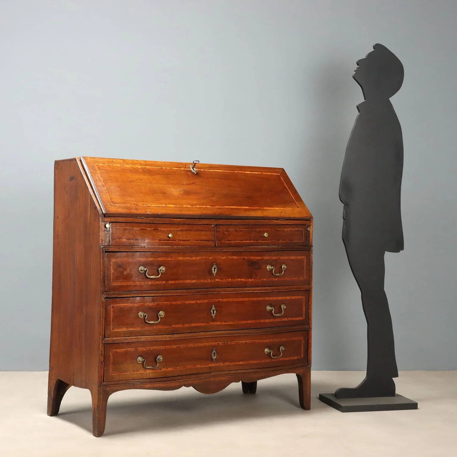 Antique drop-leaf cabinet in walnut with maple inlays, Italy, mid-18th century.