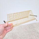 Vintage gold vinyl record holder from the 60s