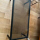 Smoked glass coffee table with chrome metal.