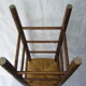 Ancient wooden and straw stool